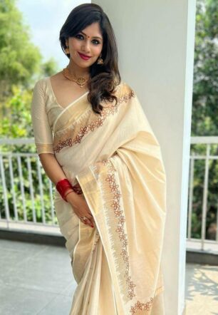 Flower shed golden tissue embroidered saree